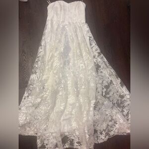 Worn once for my rehearsal dinner. White strapless bridal dress